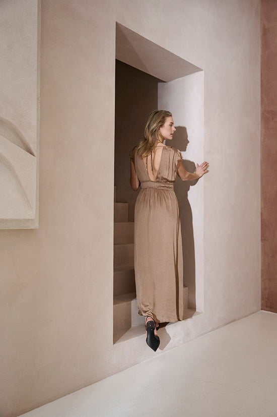 Feminine gathered waist dress with cap sleeves and tie-back detail