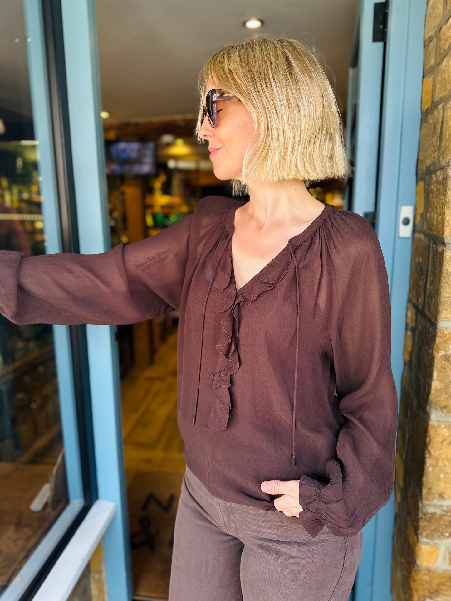 EsQualo Tops Ruffle Tie Top in Chocolate