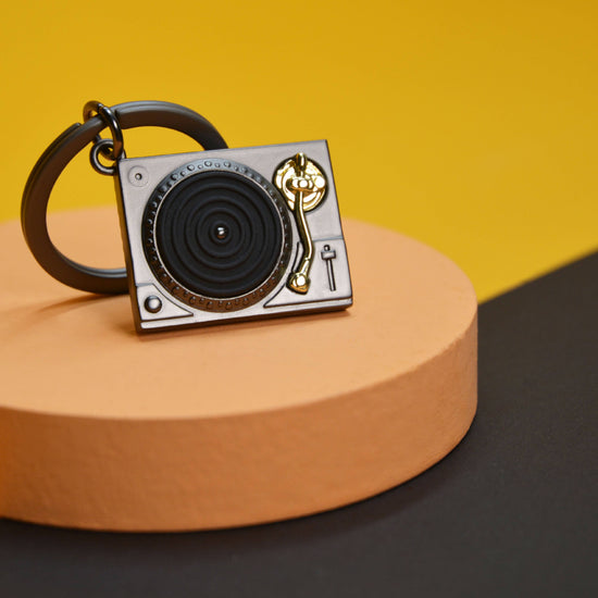 Oli Olsen Metalmorphose Matt Grey & Gold Turntable Keyring
